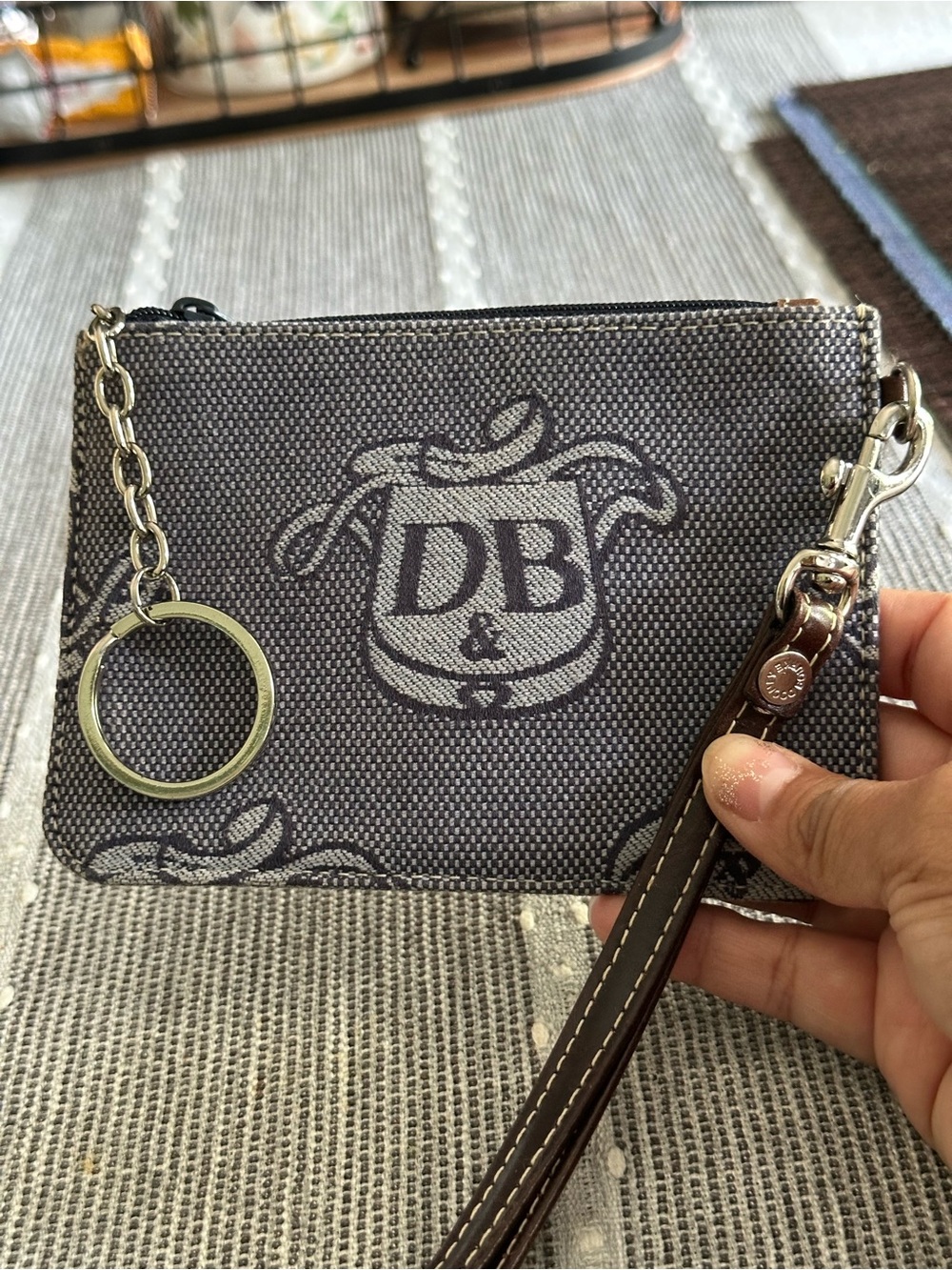 Dooney and Bourke Donegal Crest canvas wristlet and key fob